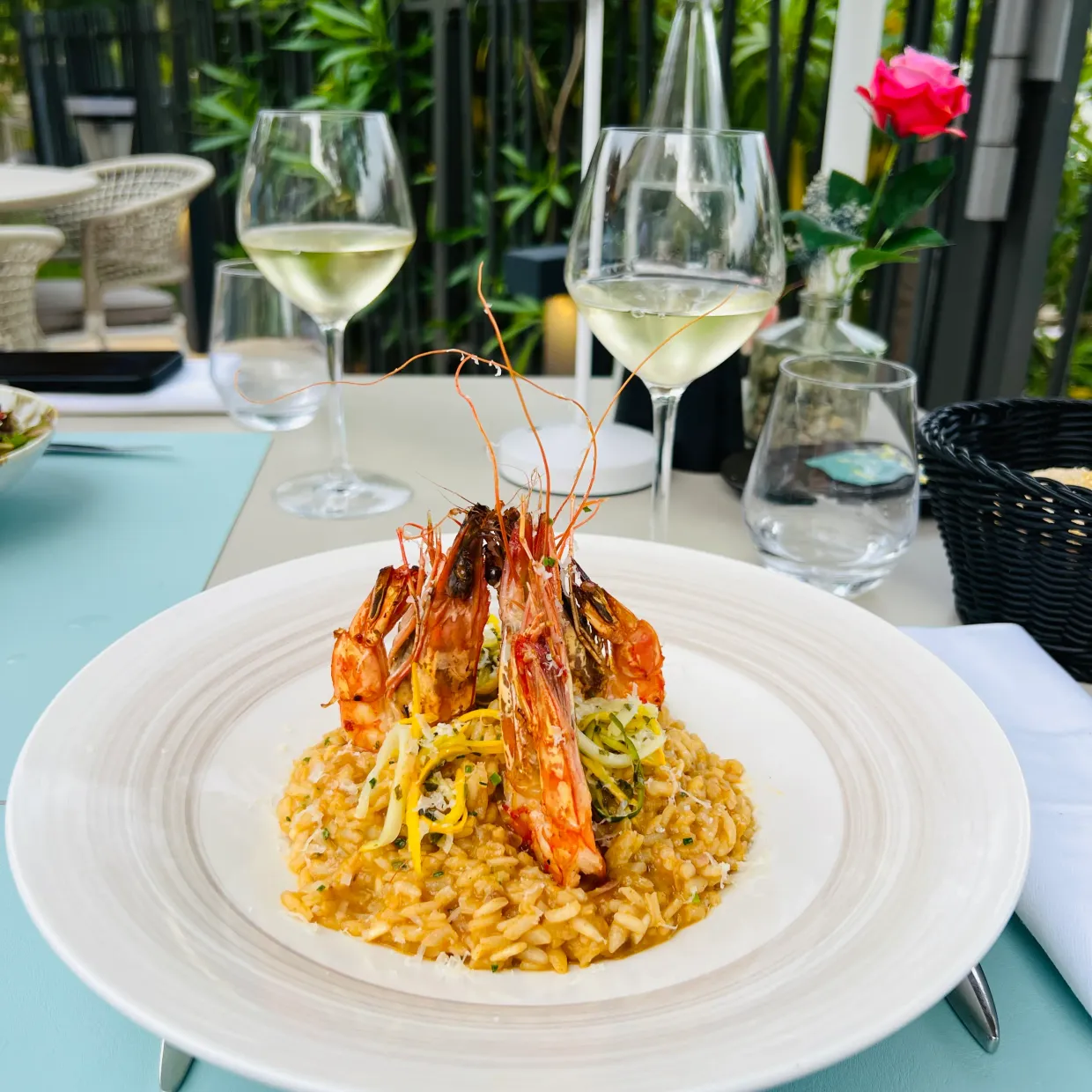 risotto with shrimps and a glass of white wine